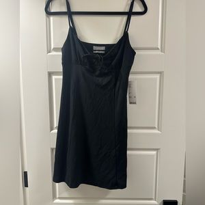 Black Urban Outfitter mini dress. New with tags.